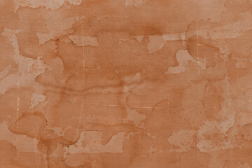 Vintage and old looking paper background. Colored orange with a brown retro book cover. Ancient book page.