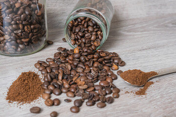 a cup on the table with coffee beans
