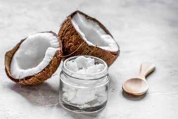 cosmetic concept with fresh coconuts on white table background