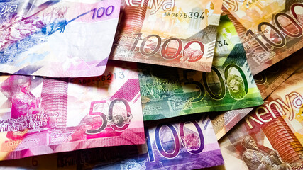 Different kenya bank notes. Many notes of Kenyan currency. One thousand, fifty bob shilling, five hundred and more mixed.