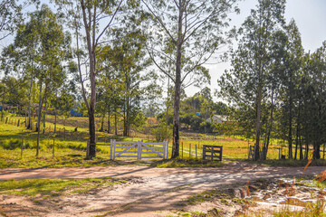 Wooden gate and rural property entrance in southern Brazil
