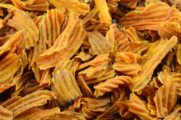 Food background of close up of sweet potato chips snack food