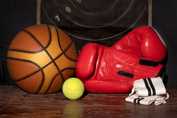 sports equipment balls and boxing gloves