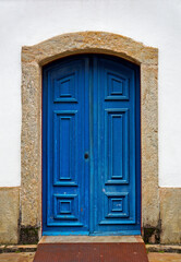 Ancient colonial door in historical city of Ouro Preto, Brazil
