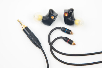 In-ear headphones for Hi-Fi music player. Audio sound and modern equipment for music lovers and...