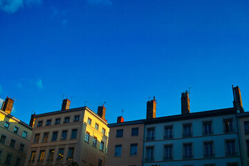 The roof, the chimney, and the sky