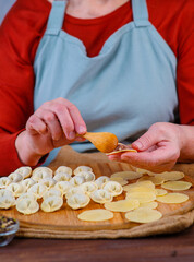 Cook makes dumplings, large hands photo