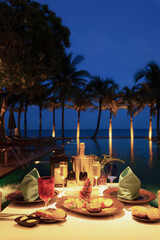 grilled beef and tiger prawn with roasted potatoes and grilled vegetables