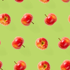 Seamless pattern with ripe apples. Tropical fruit abstract background. Apple seamless pattern on green background.