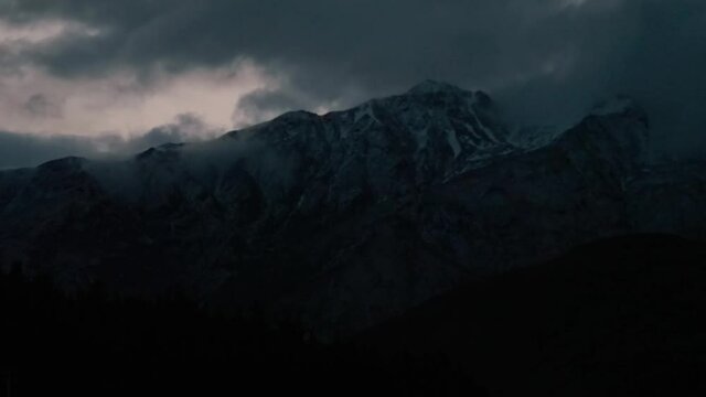 Dark evening mountain cloud timelapse