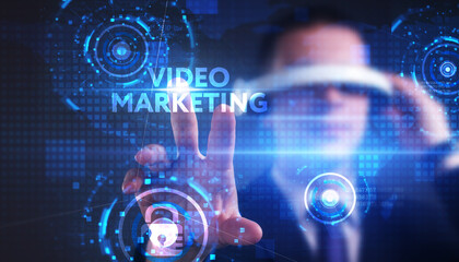 Business, technology, internet and network concept. Young businessman thinks over the steps for successful growth: Video marketing