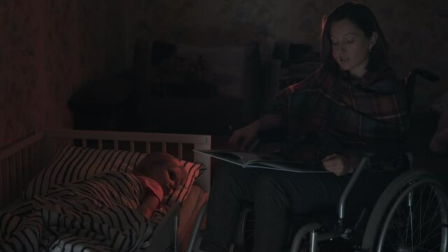 Mother in wheelchair reading to her child