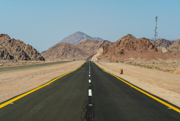 Desert road in remote rural area of Tabuk in north western Saudi Arabia