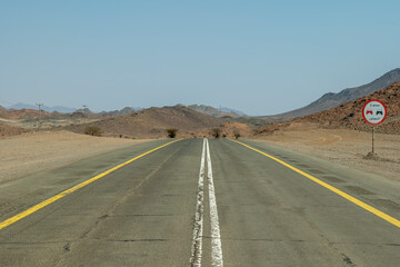Desert road in remote rural area of Tabuk in north western Saudi Arabia