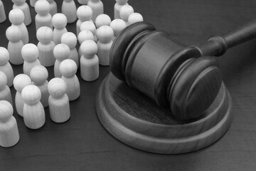 Court and civil law concept. Crowd of people and judge gavel.