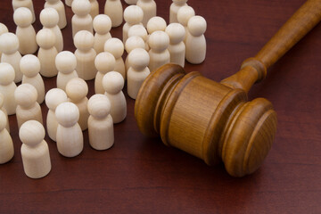 Court and civil law concept. Crowd of people and judge gavel.