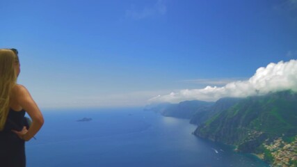 Woman Enjoying the beautiful view from the Path of the Gods Amalfi Coast Positano Italy