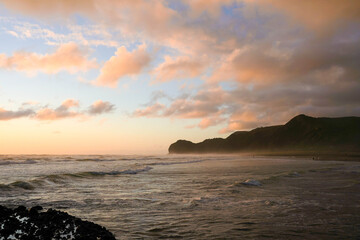 Fototapeta na wymiar a beautiful sunset beach picture from piha beach
