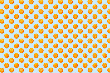 Autumn background made frem pumpkin. Background of orange miniature pumpkins. Thanksgiving or halloween background