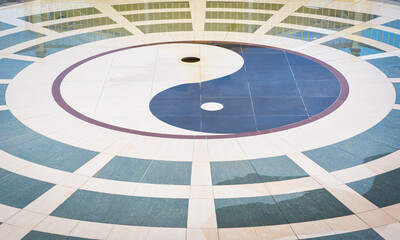 yin yang symbol on floor with tile /