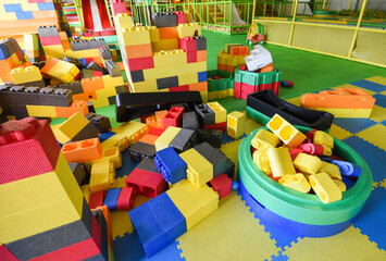 Children playground indoor at amusement park with Puzzle toy  for playing - Inside the beautiful kids playground toys colored plastic of game room