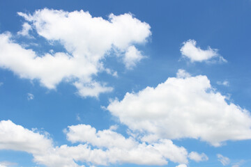Obraz na płótnie Canvas Bright blue sky with white clouds