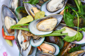 Seafood shellfish steamed mussels - Mussels cooked food with herb ingredients