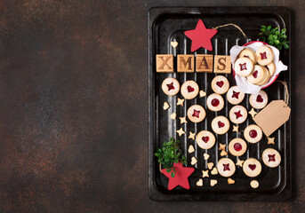 Traditional Austrian christmas cookies - Linzer biscuits filled with raspberry jam.