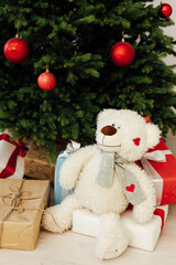Christmas tree pine with gifts toy white soft bear
