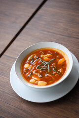 Tom Yum is one of the most famous of all Thai foods. Tom yum is made from lemongrass, galangal, kaffir lime leaves, fresh Thai chilies, fresh lime juice, and variant of seafood.