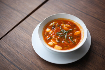 Tom Yum is one of the most famous of all Thai foods. Tom yum is made from lemongrass, galangal, kaffir lime leaves, fresh Thai chilies, fresh lime juice, and variant of seafood.