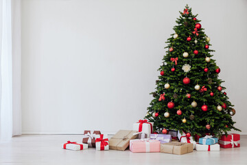 Christmas tree with gifts pine new year decor interior of the house postcard