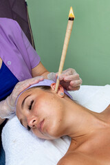 ear cleaning with a Hopi candle in the SPA.