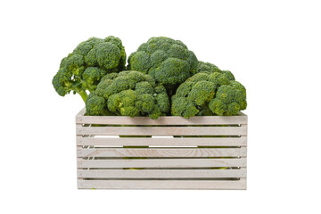 Fresh tasty broccoli in wooden box isolated