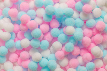 White, pink and blue soft pompons