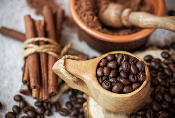 composition of coffee beans, shecolade, cinnamon and cocoa
