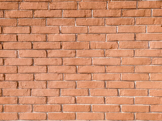 Restored old red brick wall.  White paint was smeared between the bricks.