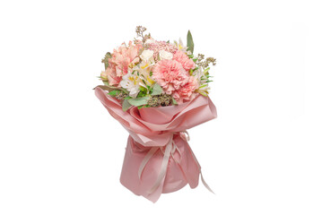 Bouquet of  soft pink flowers in wrapping paper.