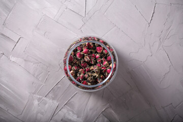 dry rosebuds for tea are on the table