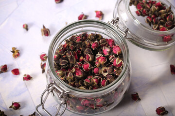 dry rosebuds for tea are on the table