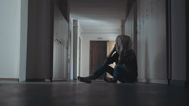 Nervous drug addict woman in pain