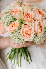 A bride holding wedding bouquet closeup