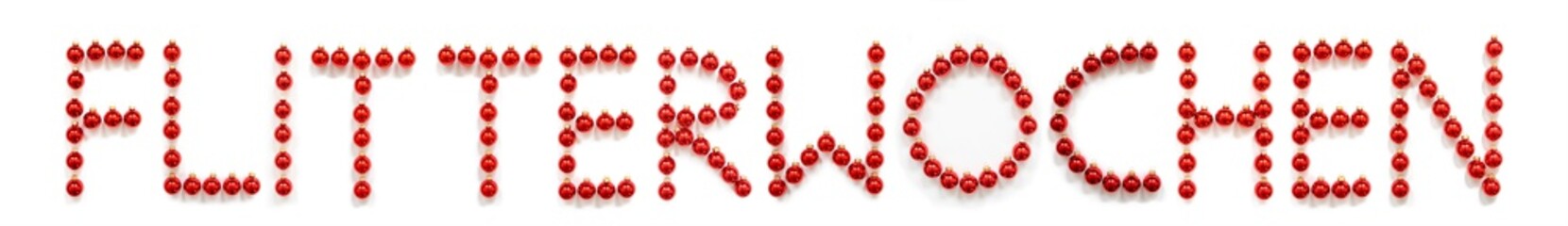 Red Christmas Ball Ornament Building German Word Flitterwochen Means Honeymoon. Festive Christmas Decoration. White Isolated Background