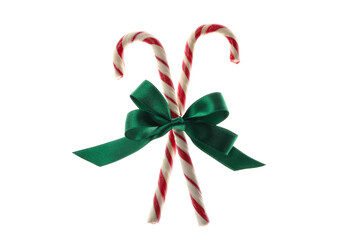 Green gift bow with candy canes isolated on white background