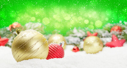 Fototapeta na wymiar Christmas greeting card with decor in snow
