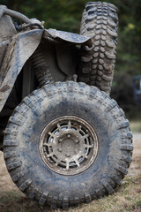 Fototapeta na wymiar Muddy off road tire on a 4x4 car