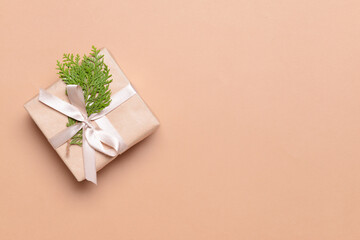 Beautiful Christmas gift on color background