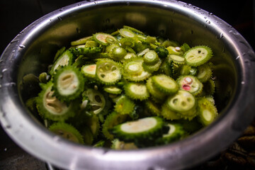 Fresh green chopped veggies in steel container