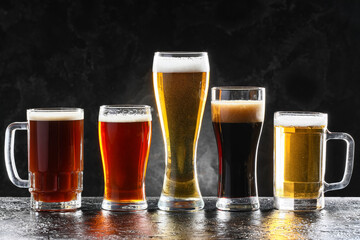 Glassware of fresh beer on table