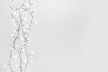 Christmas garland on light background